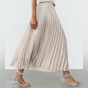 Pleated satin skirt